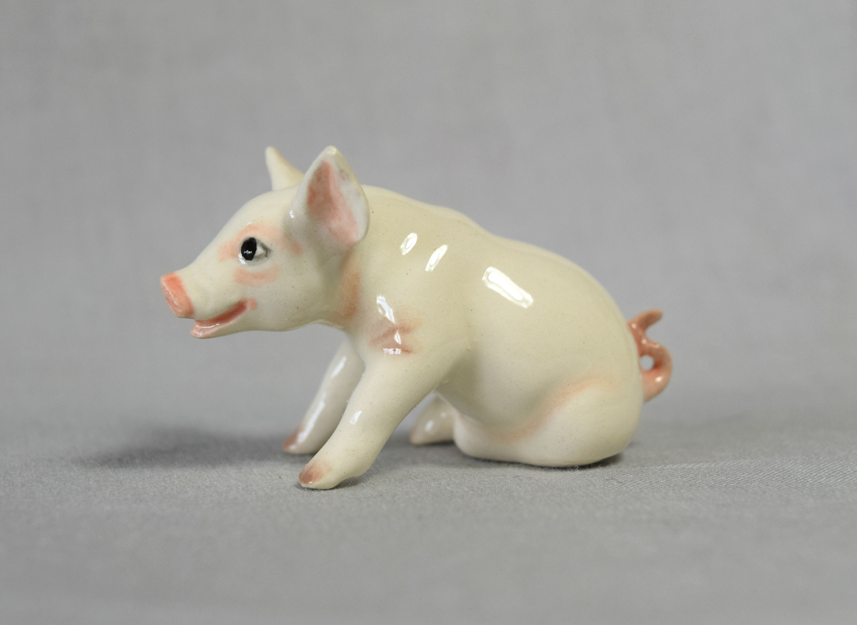 Pig Baby, seated -image