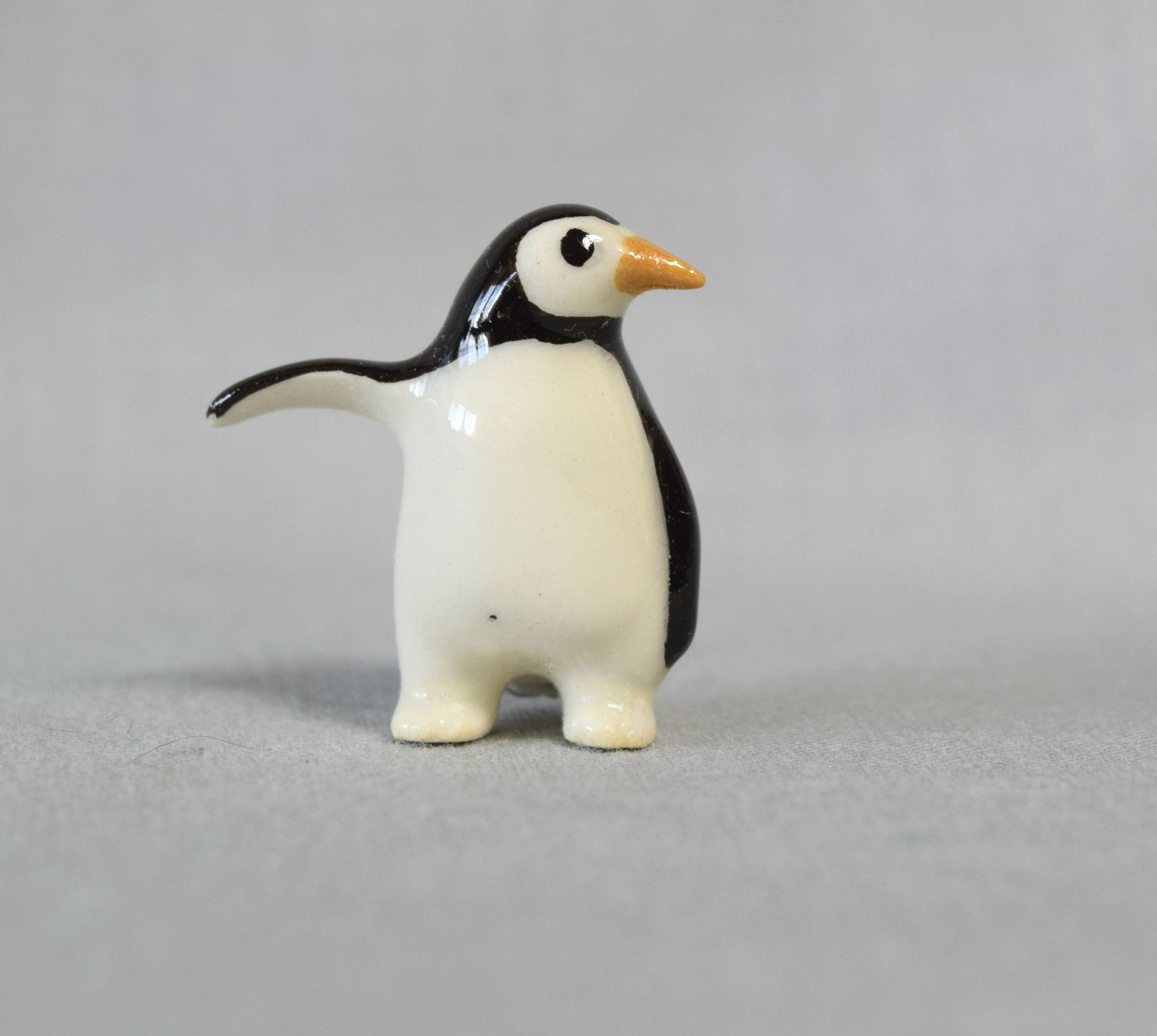 Penguin baby, wing up main image