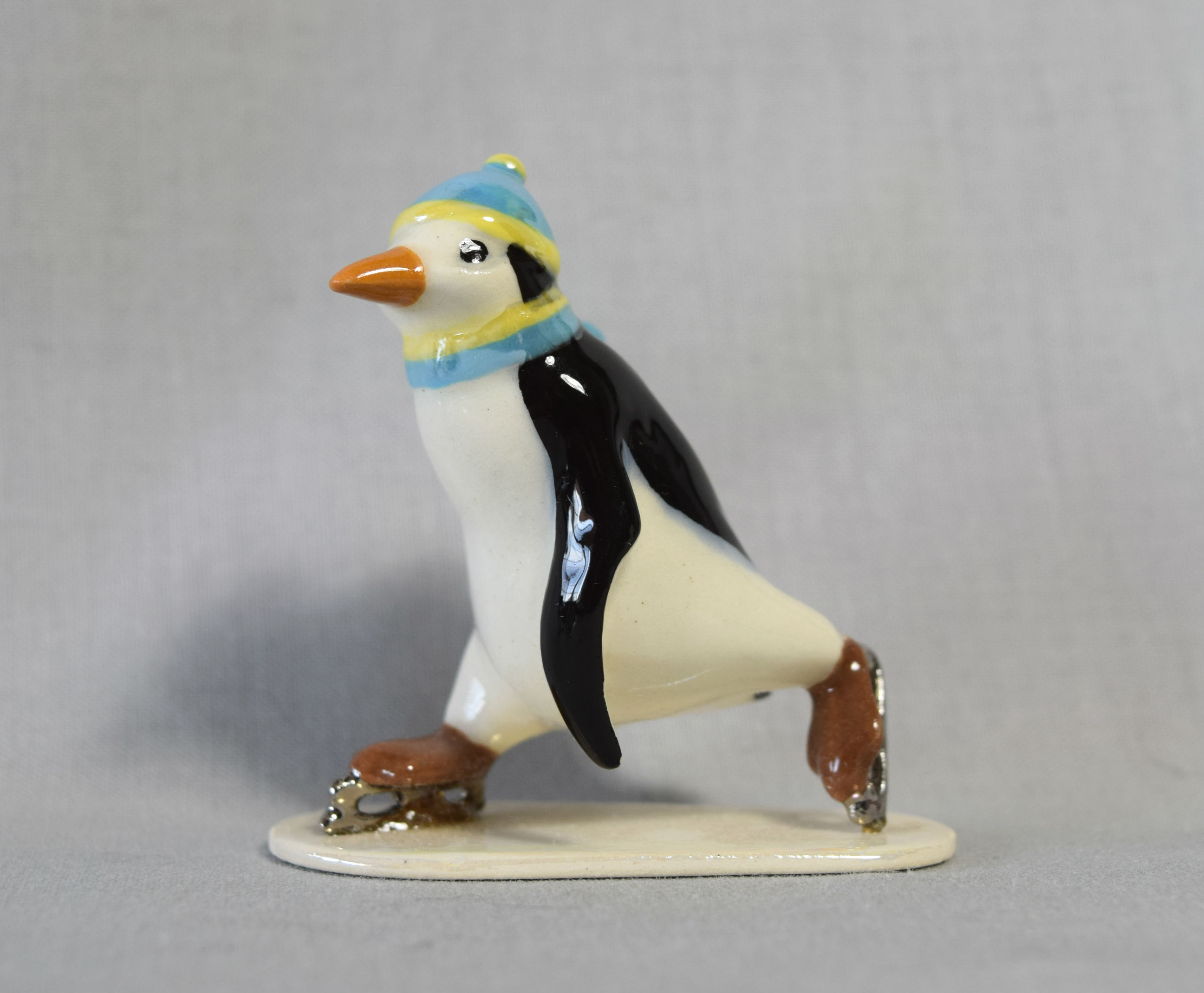 Penguin, skating upright-image